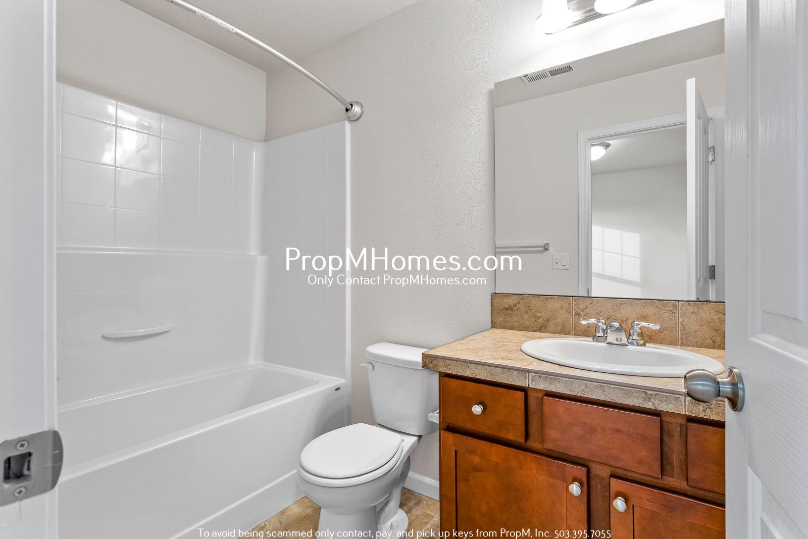 2-Bedroom Townhome in the Progress Ridge Area – Sleek Finishes, Private Balcony, and Garage! property image